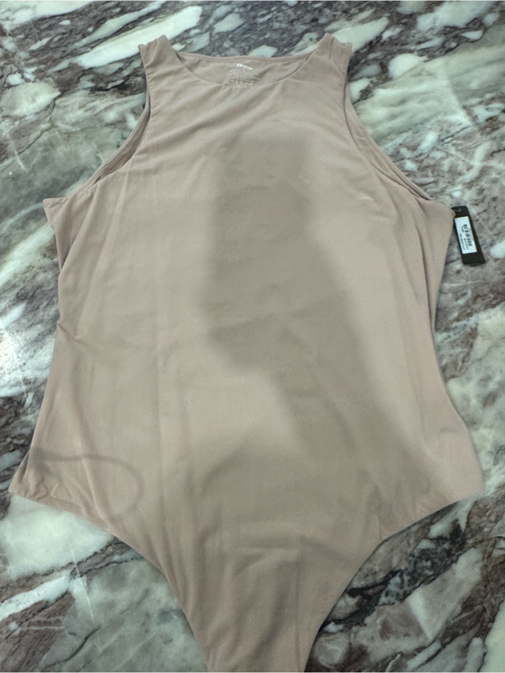 SKIMS Sleeveless High-Neck Bodysuit in Light Taupe
